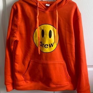 An orange Drew sweatshirt off of Amazon! Size large